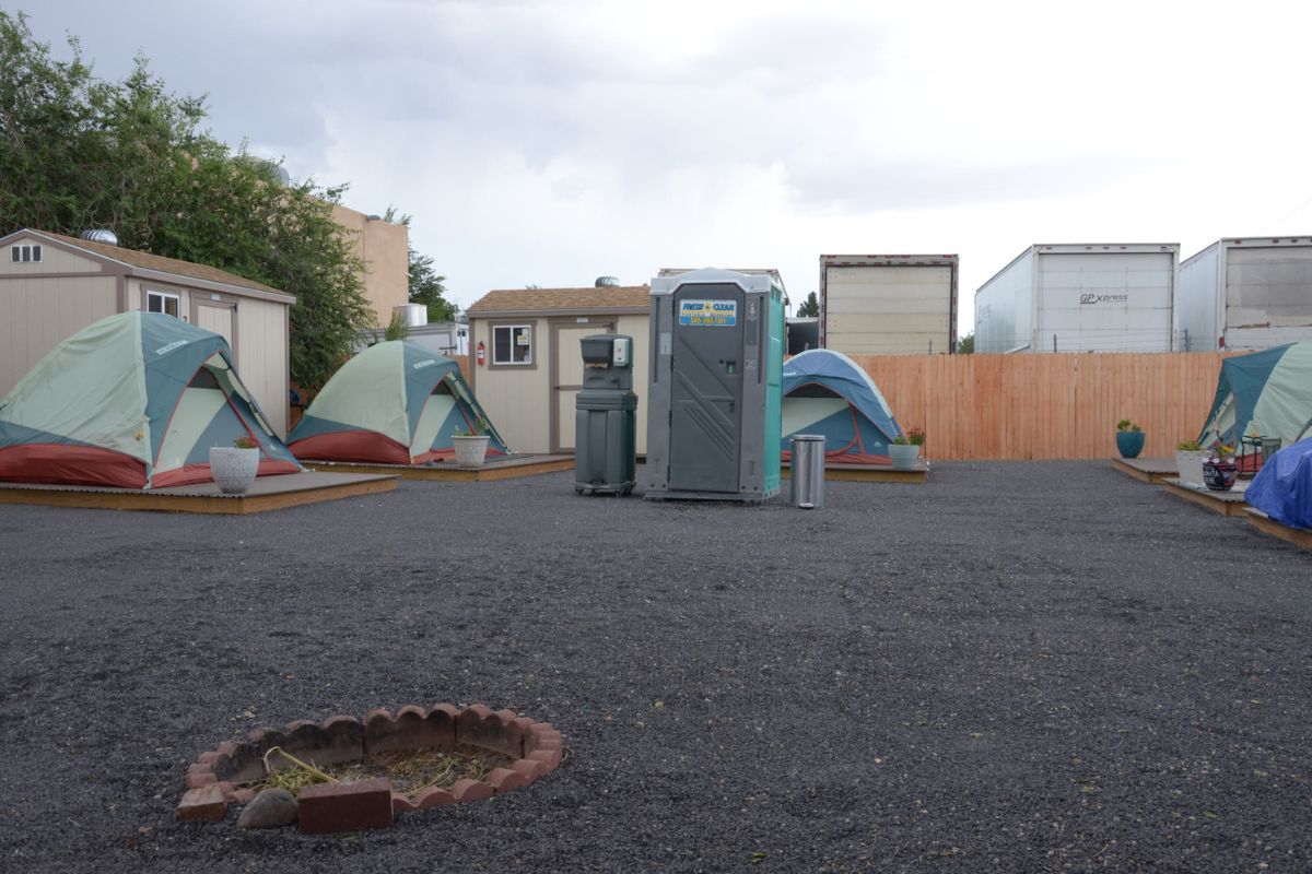Residents find community and support in shared tents behind New Creation Albuquerque Church. (Jesse Jones)
