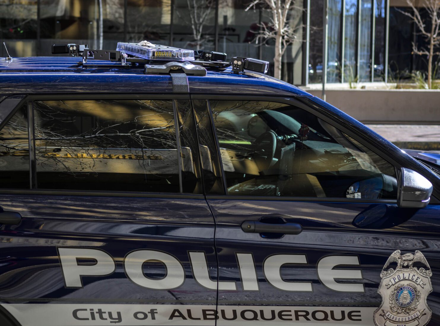 An Albuquerque Police Department (APD) cruiser with a license plate reader attached to the roof. Photographed in downtown Albuquerque. Photo by Roberto E. Rosales/The City Desk.
