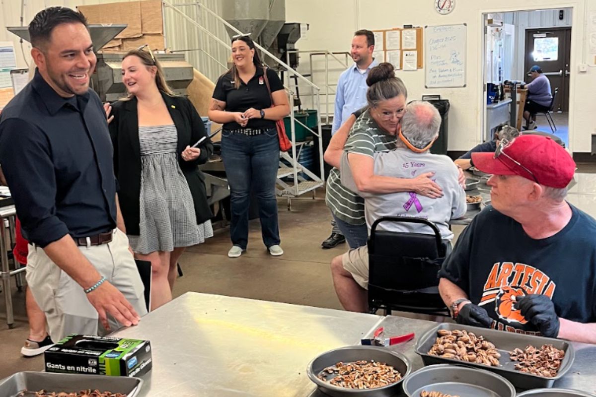 U.S. Rep. Gabe Vasquez visits with people at disability service provider CARC, Inc., highlighting what he called the devastating impact of Medicaid cuts tied to the new Republican tax law. (Vasquez)