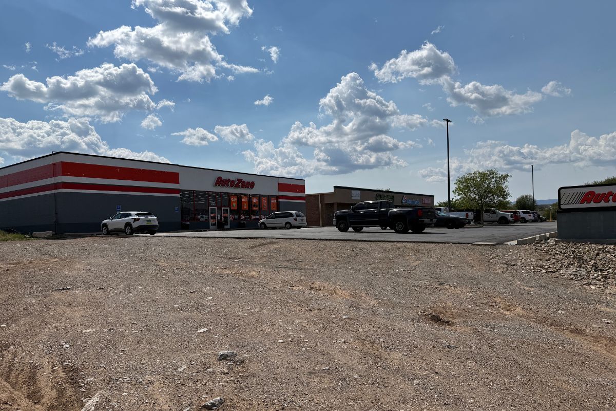 A two-year-old died in this parking lot Saturday after falling from a moving vehicle and being hit by the same car. (Staff photo)