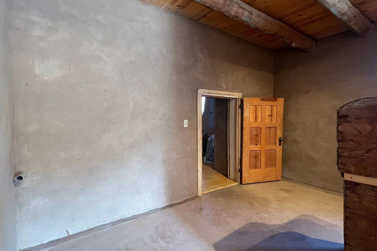 The interior restoration of Corrales' historic Old San Ysidro Church has been completed, with crews now moving equipment and furnishings back into the 156-year-old adobe building, Mayor James Fahey announced. (Corrales Historical Society)