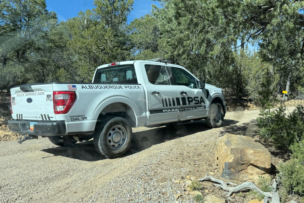 Albuquerque police were on scene on Piñon Road in Cedar Crest Thursday afternoon following an APD officer, who was wanted for numerous crimes, committing suicide during a standoff with police early Thursday. / The Independent staff photo