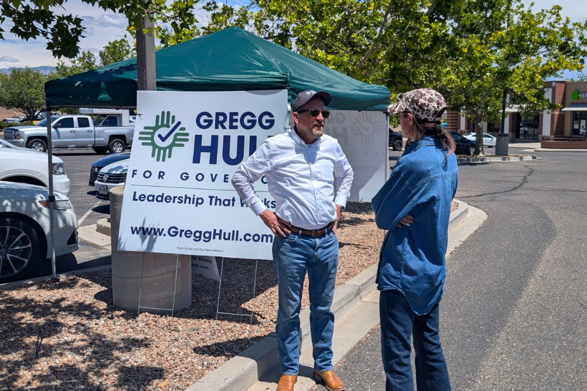 Gregg Hull talks with a voter during the primary election on June 2. (Kevin Hendricks)