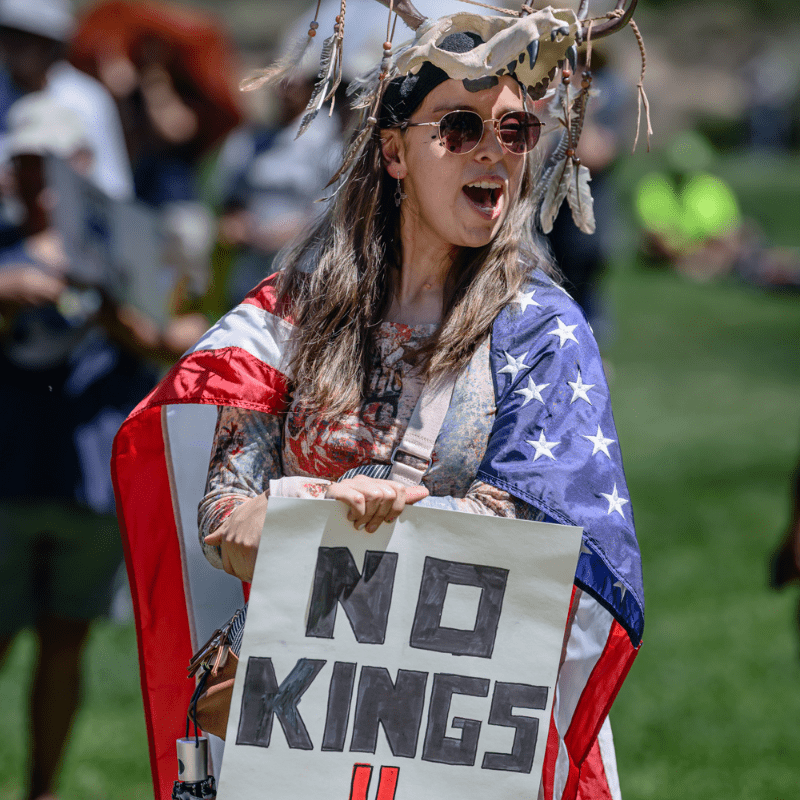 No crowns, just ballots: Sandoval County Indivisible trades protest signs for ‘Vote Here’ arrows